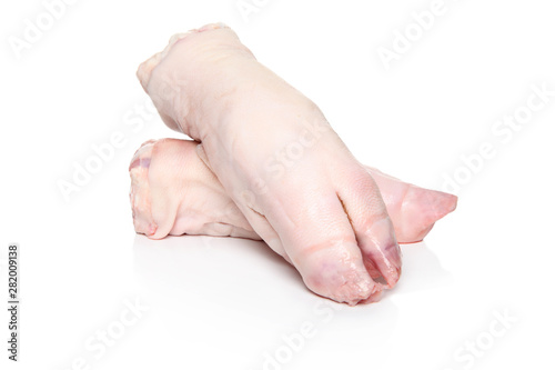 Raw Pig trotters on white background