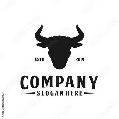 Minimalist cow / bull head silhouette logo design photo