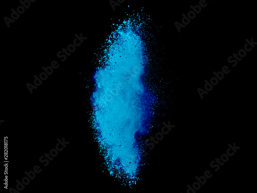 Blue powder explosion isolated on dark background.