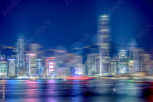 Fototapeta Naklejka Na Ścianę i Meble -  Abstract bokeh light with Hong Kong City night view background; Double Exposure