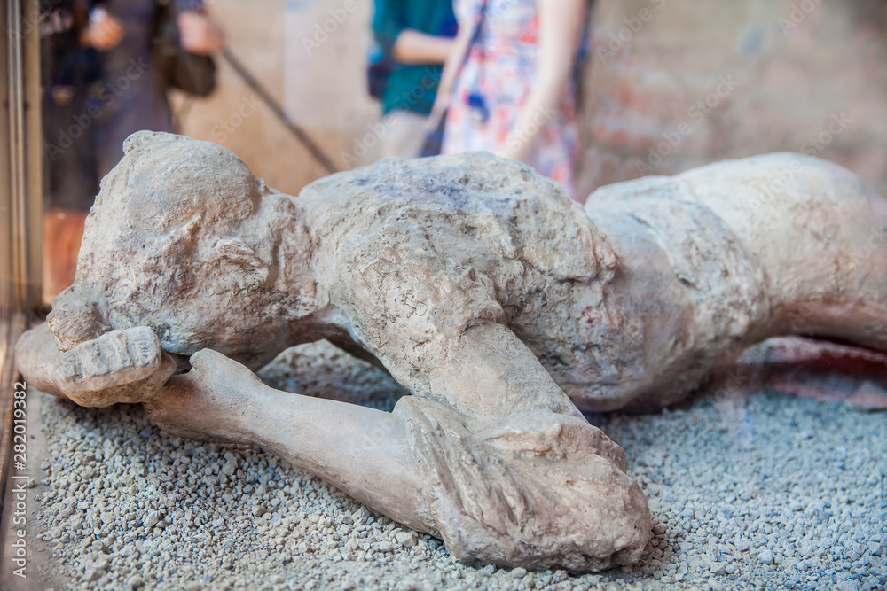 Plaster cast body of a female victim of the ancient city of Pompeii ...