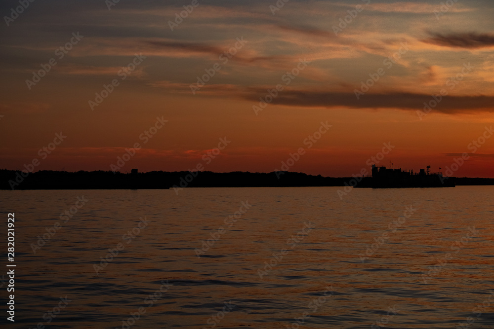 Naklejka premium Sunset on the Amur river embankment in Khabarovsk, Russia.