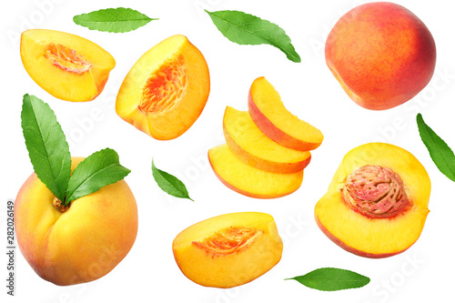 Wallpaper Mural peach fruit with green leaf and slices isolated on white background. top view Torontodigital.ca