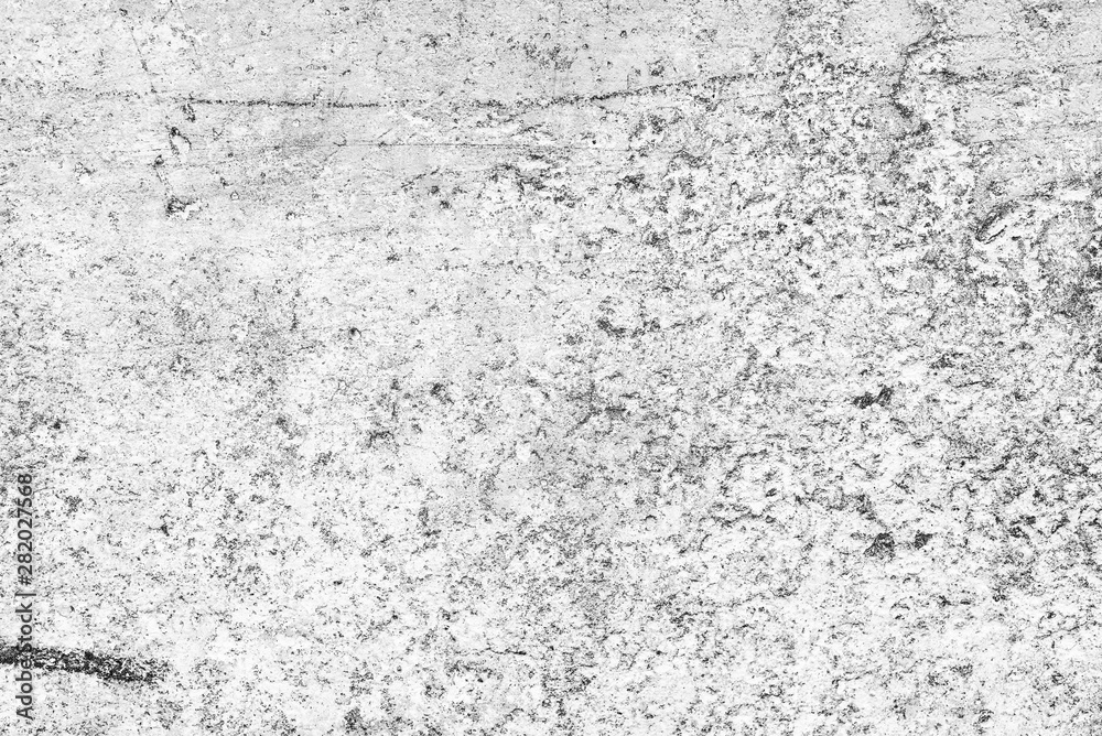Texture of a concrete wall with cracks and scratches which can be used as a background Texture of a concrete wall with cracks and scratches which can be used as a background