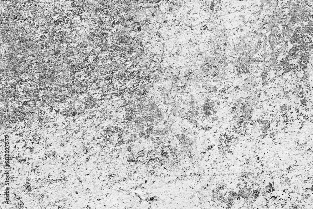 Texture of a concrete wall with cracks and scratches which can be used as a background