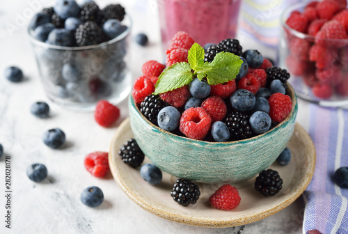 Fresh wild berries in bowl
