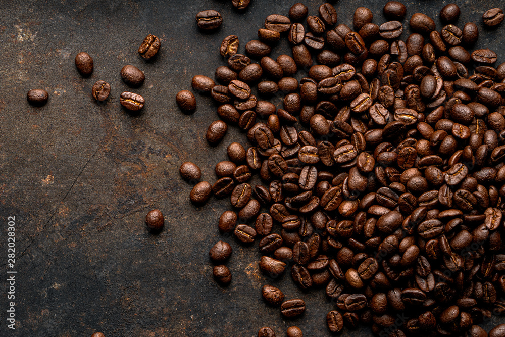 Coffee, coffee beans on the table, dark background, top view , Free space for text input Coffee, coffee beans on the table, dark background, top view , Free space for text input