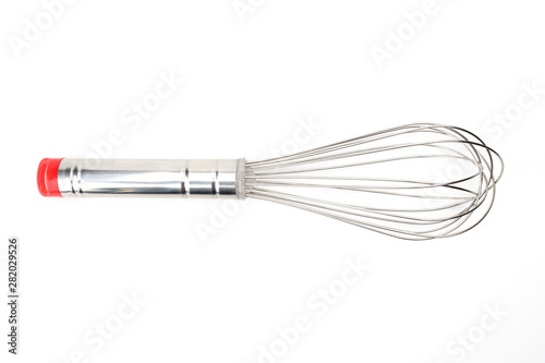Silver whisk isolated on white background.