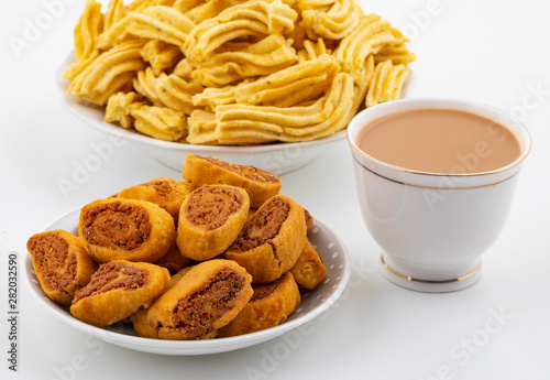 Indian Traditional Spicy Snack Ghatiya With Bhakarwadi Also Know as Ganthiya, Papdi, Gathiya, Bakarwadi, Bakarvadi, Bakar Vadi or Bakar Wadi Are Deep Fried Snack Made From Chickpea Flour photo