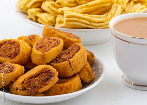 Indian Traditional Spicy Snack Ghatiya With Bhakarwadi Also Know as Ganthiya, Papdi, Gathiya, Bakarwadi, Bakarvadi, Bakar Vadi or Bakar Wadi Are Deep Fried Snack Made From Chickpea Flour photo