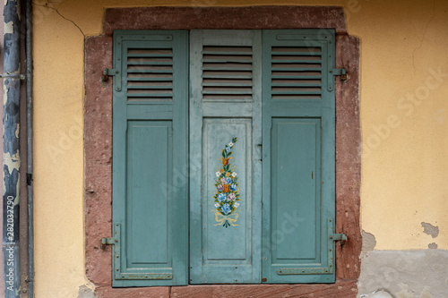 Traditional wooden window cover in Colmar  France