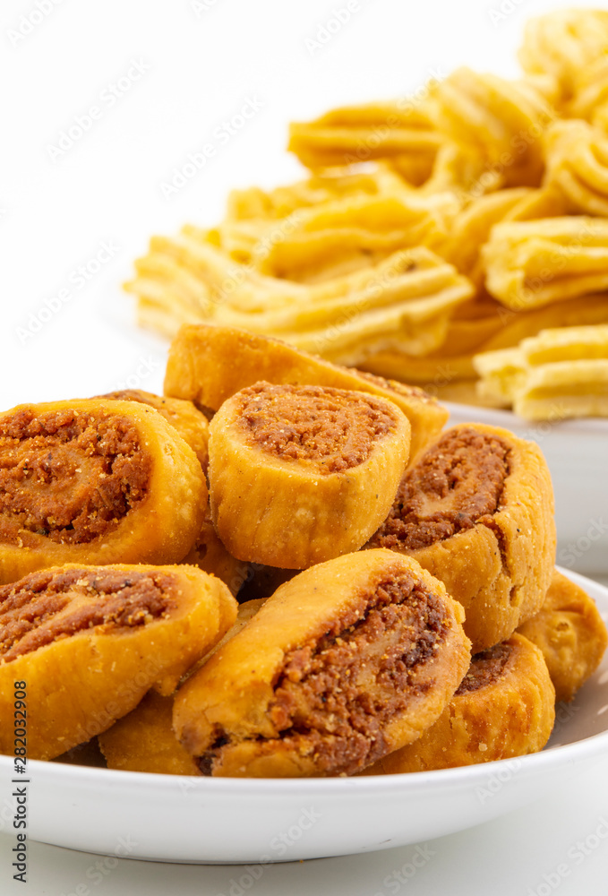 Indian Traditional Spicy Snack Ghatiya With Bhakarwadi Also Know as Ganthiya, Papdi, Gathiya, Bakarwadi, Bakarvadi, Bakar Vadi or Bakar Wadi Are Deep Fried Snack Made From Chickpea Flour. Indian Traditional Spicy Snack Ghatiya With Bhakarwadi Also Know as Ganthiya, Papdi, Gathiya, Bakarwadi, Bakarvadi, Bakar Vadi or Bakar Wadi Are Deep Fried Snack Made From Chickpea Flour.