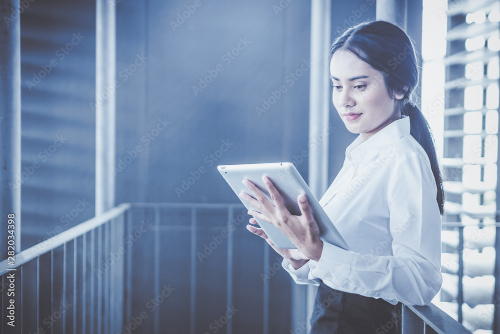 Consultant engineer discussing construction project in blueprint; Consulting concept in construction at office indoor Consultant engineer discussing construction project in blueprint; Consulting concept in construction at office indoor
