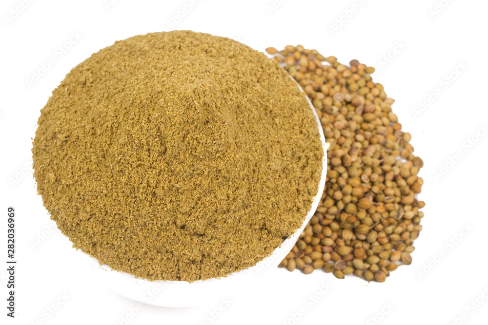 coriander powder with coriander seeds isolated on white background coriander powder with coriander seeds isolated on white background