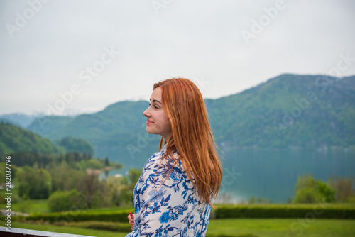 Tourism concept. Beautiful woman look at lake. Vacation in Salzburg  © T.Den_Team