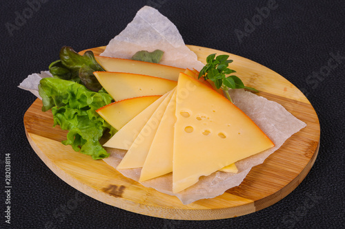 Sliced yellow Swiss cheese