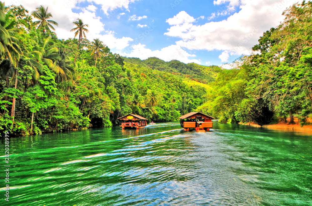 The Loboc River  -  a river in the Bohol province of the Philippines. - obrazy, fototapety, plakaty 