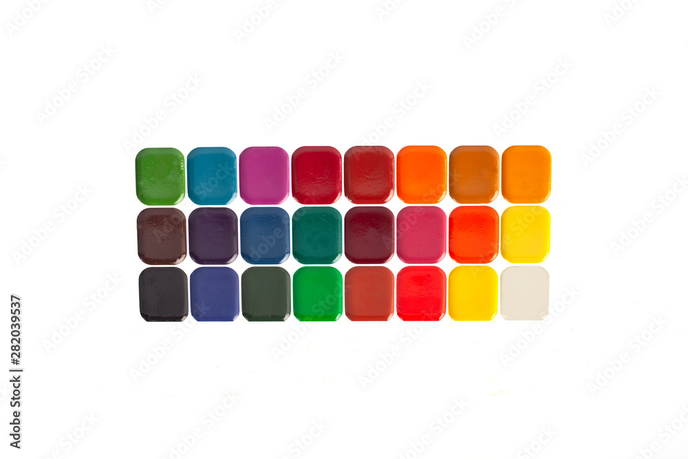 School color paints lie on a white background School color paints lie on a white background