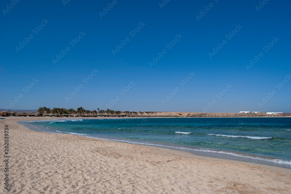 The sandy beach of Marsa Abu Dabab bay in Egypt