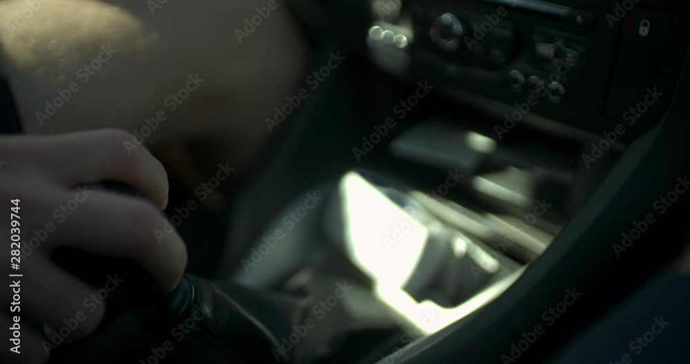 MS Man's hand shifting the gear MS Man's hand shifting the gear