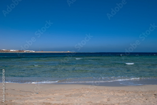The sandy beach of Marsa Abu Dabab bay in Egypt