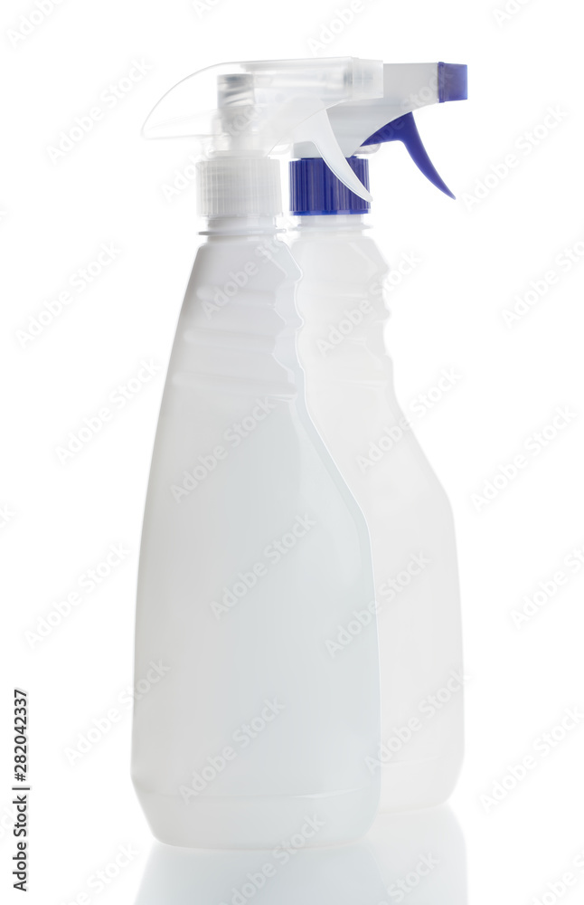 Detergents for home. Cleaning products. White blank plastic spray detergent bottle isolated on white background. Detergents for home. Cleaning products. White blank plastic spray detergent bottle isolated on white background.