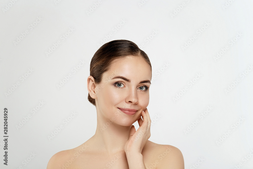 Woman Face Skin Care. Closeup Beautiful Sexy Woman With Perfect Professional Makeup Touching Her Smooth Soft Pure Clean Skin. Attractive Female Model Caressing Face. Beauty Cosmetics. Woman Face Skin Care. Closeup Beautiful Sexy Woman With Perfect Professional Makeup Touching Her Smooth Soft Pure Clean Skin. Attractive Female Model Caressing Face. Beauty Cosmetics.