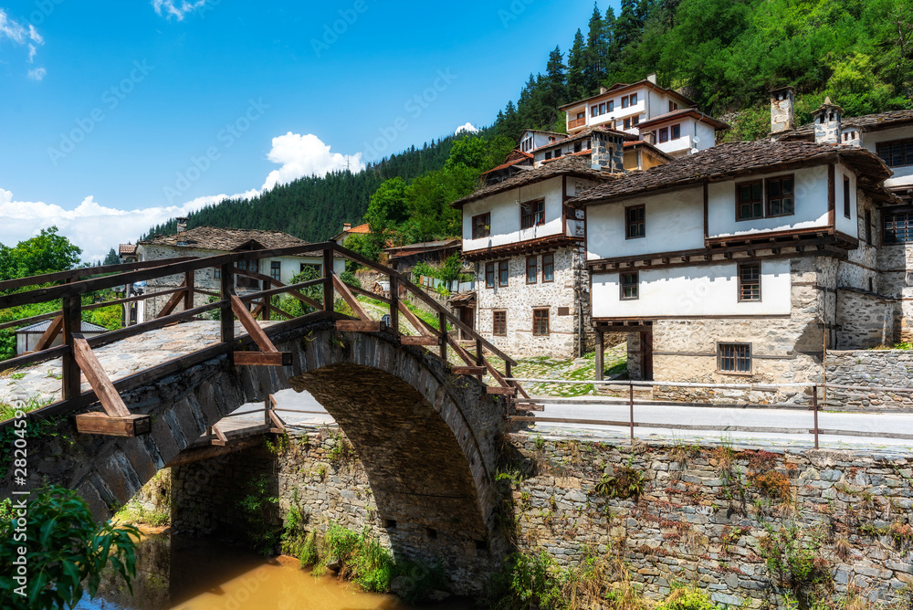  Roman Bridge and old houses in of Shiroka Laka village, Smolyan Region, Bulgaria