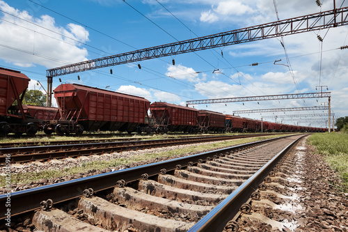 Industrial railway - wagons, rails and infrastructure, electric power supply, Cargo transportation and shipping concept.