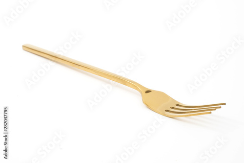 golden fork isolated on a white