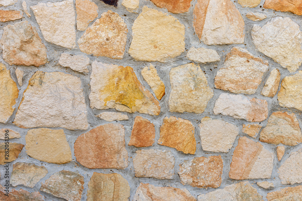 Stone wall for use as a background Stone wall for use as a background