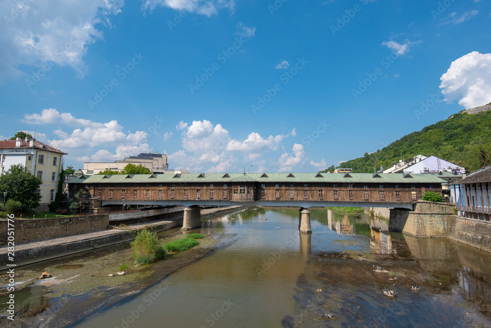 The Covered Bridge in the town of Lovech, Bulgaria, crosses the Osam River. Connecting the old (Varоsha) and new town parts. Constructed by the famous Bulgarian master builder Kolyo Ficheto