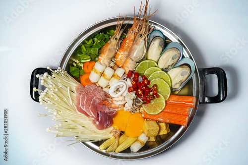 mixed thai spicy hot pot(tum yum) on white background , thai food.Hot pot soup
