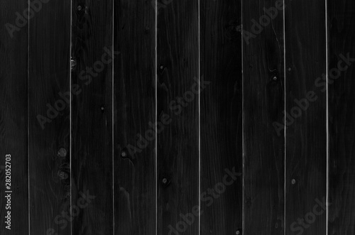top view empty black vintage wood table or floor and fence wall for work and place object or wooden board for food preparation in kitchen and use for blackboard or chalkboard background on vertical