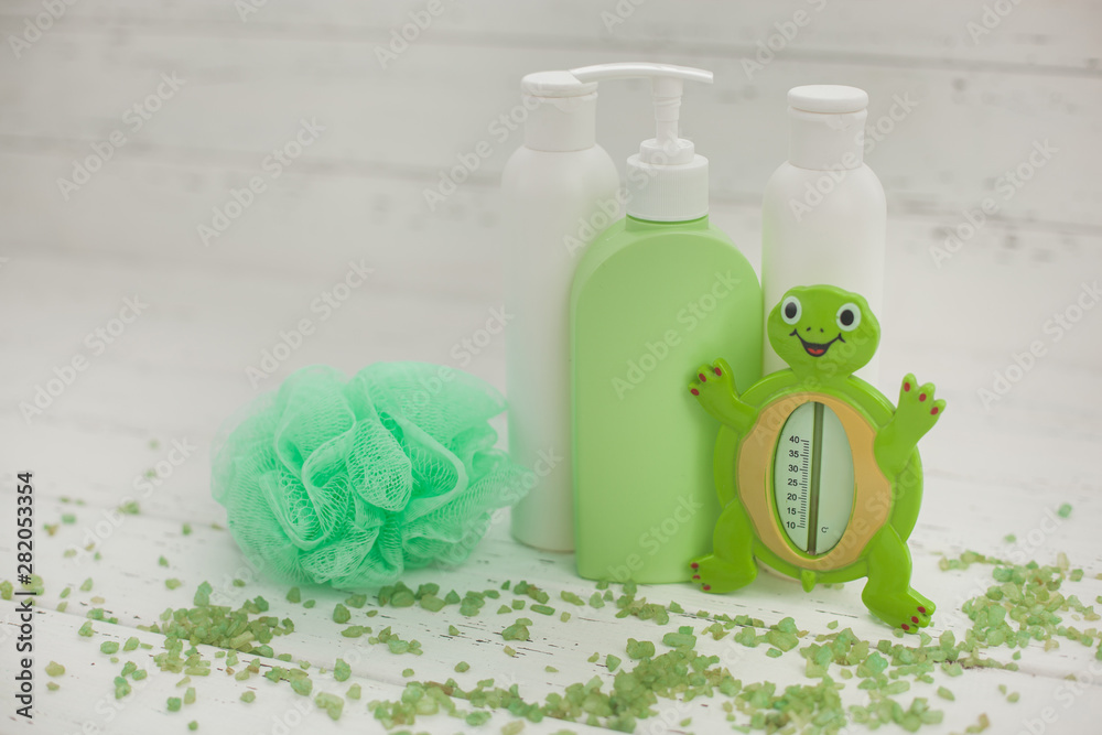 Bathing accessories. Green tubes and bottles for bath. Shower stuff. SPA for kids. Bathing accessories. Green tubes and bottles for bath. Shower stuff. SPA for kids.