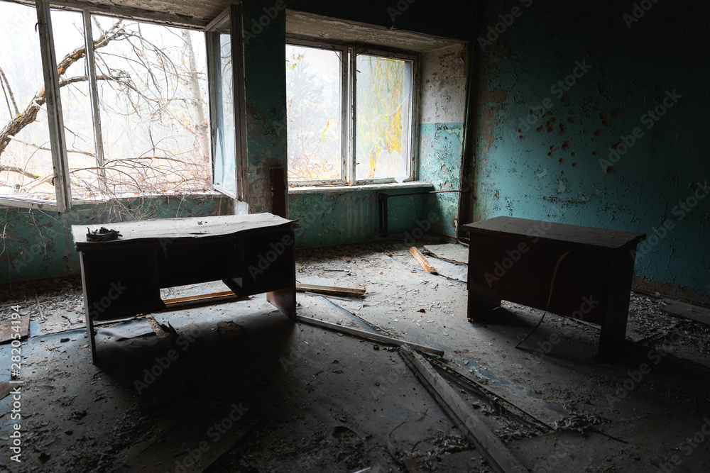 Abandoned and messy room in Pripyat post office Abandoned and messy room in Pripyat post office