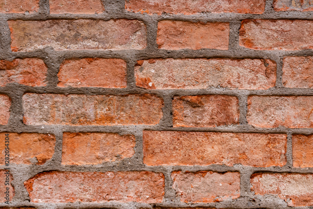 Fototapeta premium orange bricks background , texture of an old wall