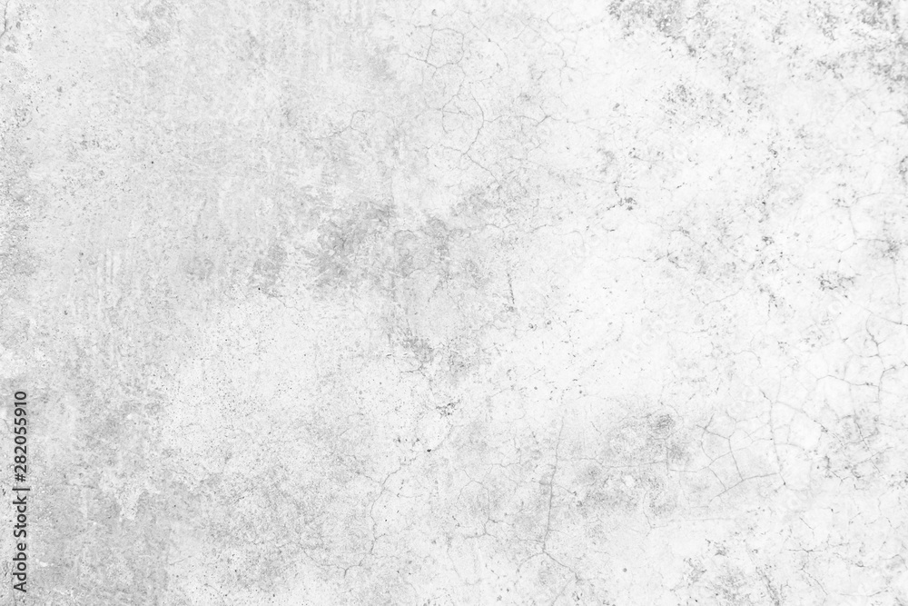 Grunge concrete wall at covered with gray cement old surface with crack in industrial building, great for your design and texture background. Black and white cracked floor texture vintage.