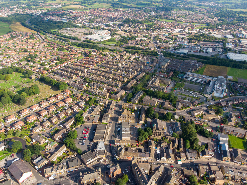 Aerial photo of the Leeds town of Pudsey in West Yorkshire, England showing typical British streets and business taken on a sunny bright summers day.