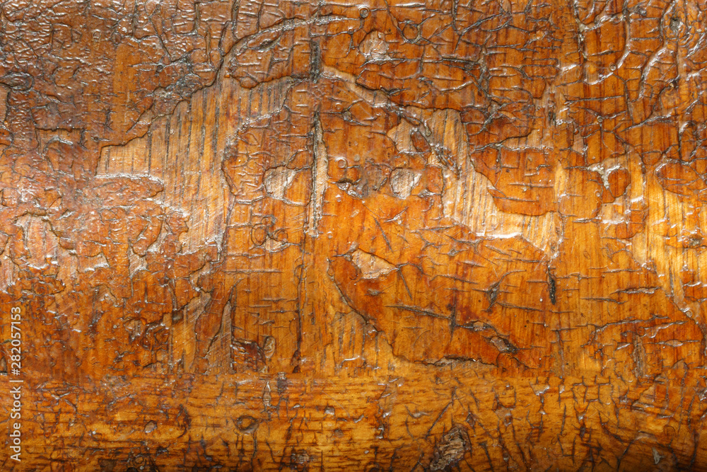 orange Wooden vintage texture with shadow. varnished wooden floor background. fragment of an old lacquered board.