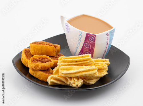 Indian Traditional Spicy Snack Ghatiya With Bhakarwadi Also Know as Ganthiya, Papdi, Gathiya, Bakarwadi, Bakarvadi, Bakar Vadi or Bakar Wadi Are Deep Fried Snack Made From Chickpea Flour. photo