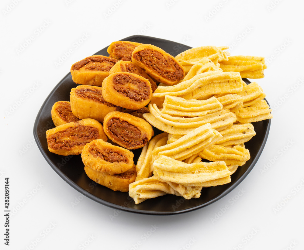 Indian Traditional Spicy Snack Ghatiya With Bhakarwadi Also Know as Ganthiya, Papdi, Gathiya, Bakarwadi, Bakarvadi, Bakar Vadi or Bakar Wadi Are Deep Fried Snack Made From Chickpea Flour.