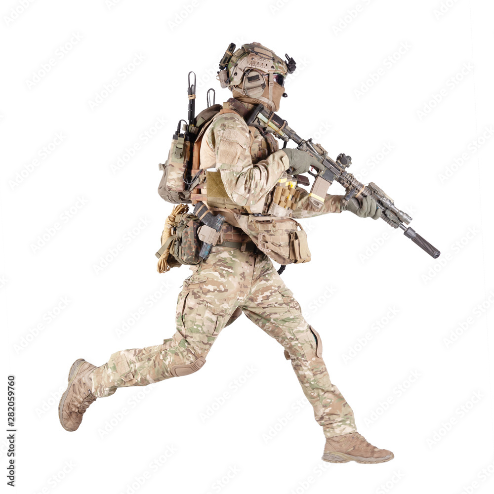 Running soldier with rifle isolated studio shoot Running soldier with rifle isolated studio shoot