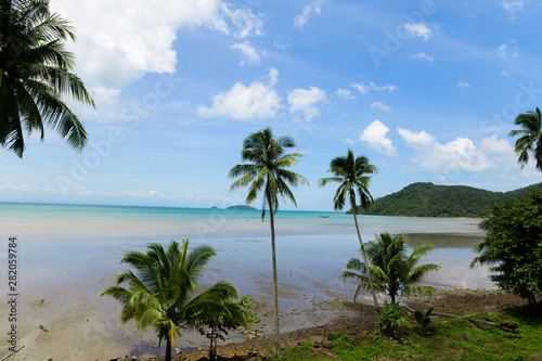 Summer beach in Thailand, blue ocean, sand, and sunshine