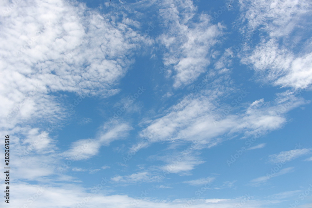 Fototapeta premium Sunset on the beach and blue sky white cloud