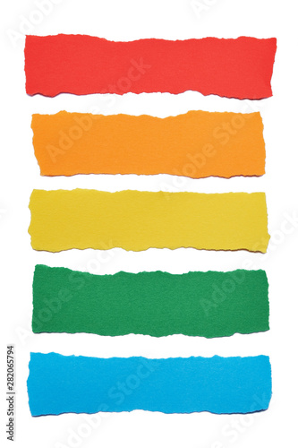 Collection of multicolored paper stripes with torn edges isolated on white background