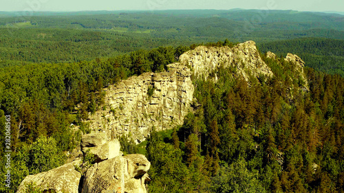 Amazing summer in steppe green grass and blue sky.