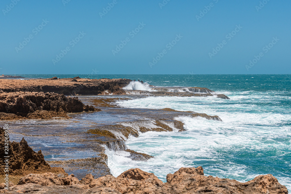Quobba Blow Holes waves and spray during windy weather in Western Australia Quobba Blow Holes waves and spray during windy weather in Western Australia