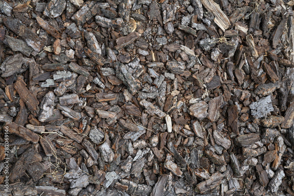 Small pieces of bark on a forest road to run on barefoot