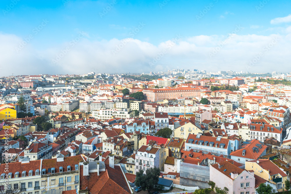 View above the old town of Lisbon to the new postmodern quarter with the Amoreiras Towers in the north-west of the town